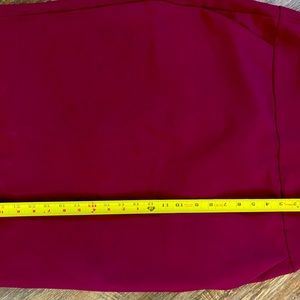 It has pockets!!! Wine colored colored pencil skirt